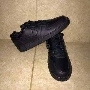 Black Nike low tops